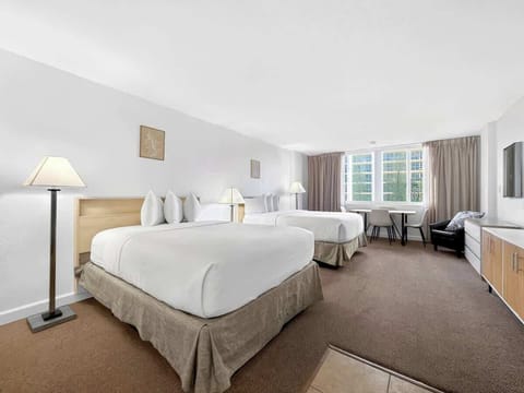 Cozy sleeping space featuring 2 Queen beds with hotel-quality linens.