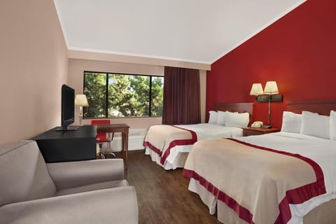 Settle into two cozy beds and a comfortable work nook.