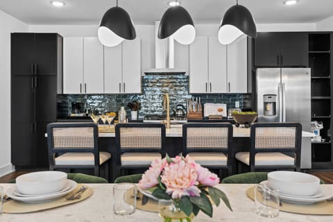 Unit 2 - Fully Stocked Gourmet Kitchen with Island Seating and Dining Table