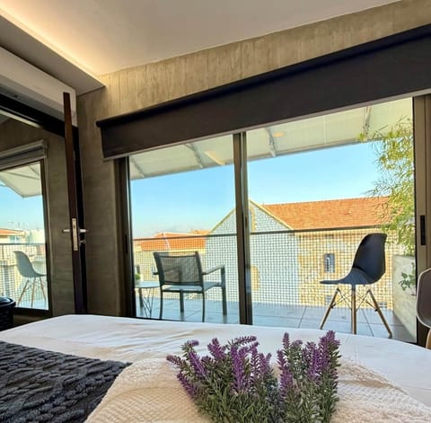 Sunlit Bedroom With Private Balcony