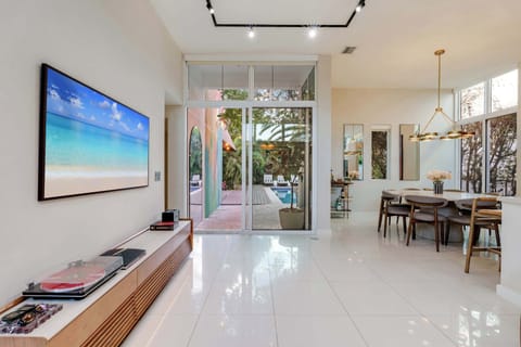 This open-concept layout connects the kitchen, dining, and living areas, making it easy to host and hang out with the whole group.