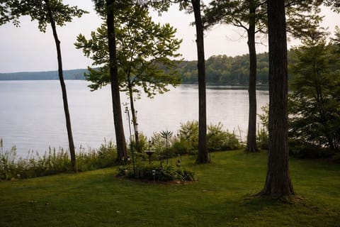 Relax by the tranquil lake during the day with picturesque waterfront views and a peaceful natural atmosphere