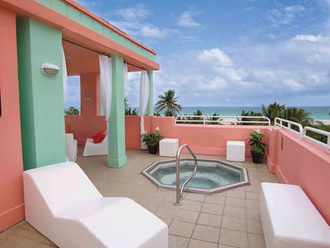 Indulge in a private hot tub with ocean breezes.