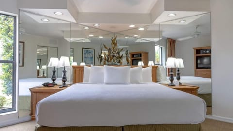 Unwind in a serene bedroom with crisp linens and soft lighting