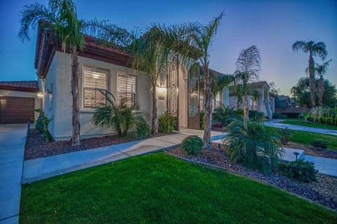 The front door is easily accessible by both path and stairs. 