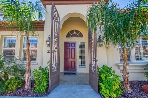 An ornate iron front gate welcomes you to the start of your getaway.
