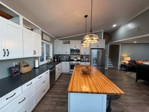 The open kitchen offers ample space & all the comforts of home