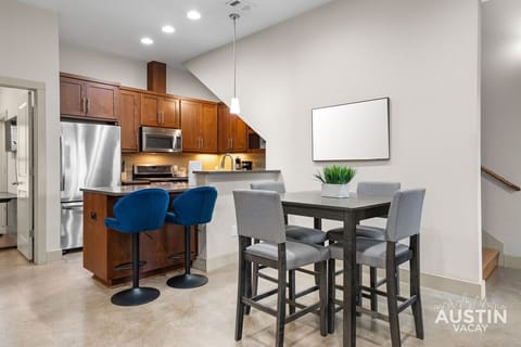 Island seating for two plus a dedicated dining table for four