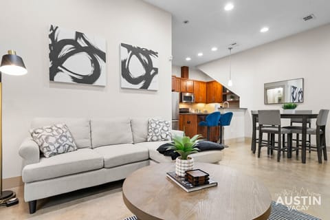 Gather on the sectional while dinner simmers just steps away