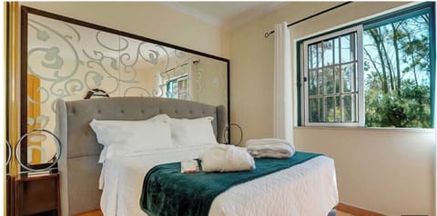Bask in natural light with calming views from the bedside.