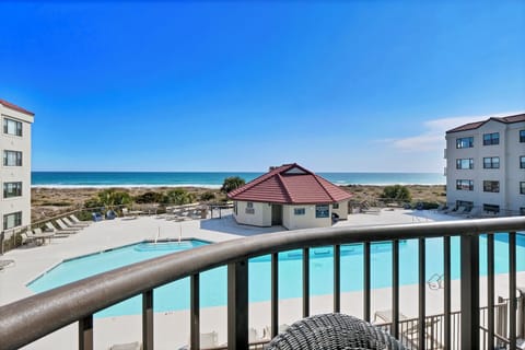 Pool and ocean views from balcony.