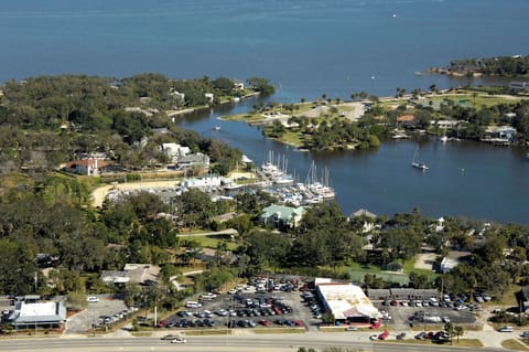 Enjoy a gentle view of the marina, where boats drift peacefully along the calm waters.