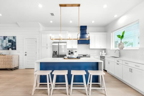 Nautilus features a beautiful quartz island seating for grab-and-go meals! 