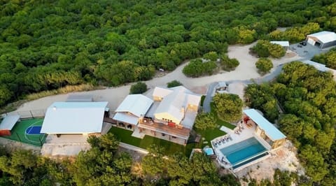 Overhead view of Sunset Ridge, Lodge, carport, basketball, pool, gaming garage