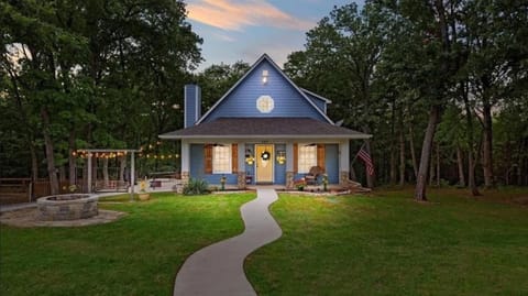 View of front yard at dusk