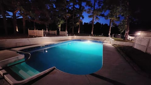 Take a dip in the inviting soft ambient lighting in and around the pool. 