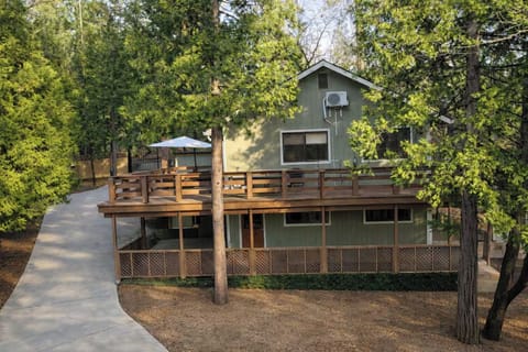 Spacious elevated deck offers a peaceful forest retreat