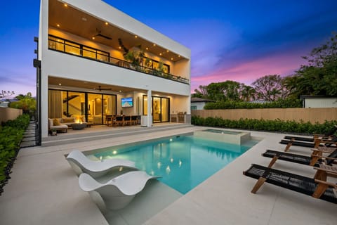 Float in your private heated pool while Victoria Park hums quietly around you — 7 minutes from sand.