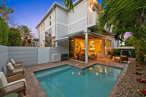 Relax and enjoy your private pool and modern coastal retreat.