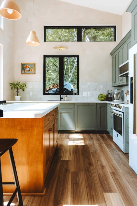 Kitchen is equipped with everything you need for cooking. Induction stove, oven, mixer, knives, pots and pans, and basics including flour, sugar, salt, olive oil, spices.  Keurig coffee maker and an assortment of coffee is available. 