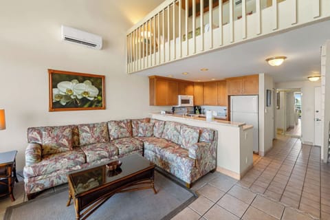 Unit 1 Comfortable sofa that converts to a queen-sized bed for extra guests.