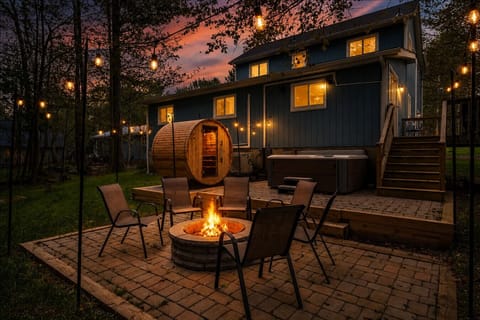 Your backyard oasis awaits! Unwind in the hot tub, relax in the sauna, or gather around the fire pit for cozy evenings under the stars.