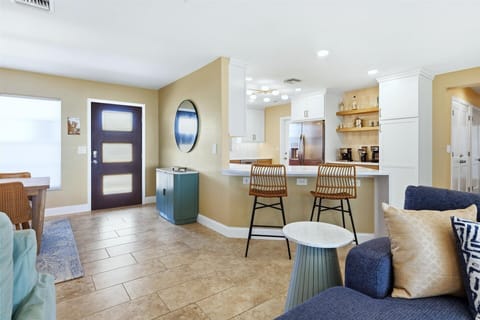 Beautiful open living space overlooking the sparkling pool with an amazing view of the Peace River