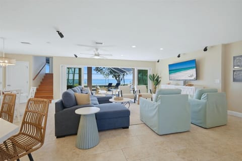 Beautiful open living space overlooking the sparkling pool with an amazing view of the Peace River