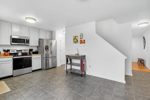 Open kitchen layout with modern appliances and plenty of space.