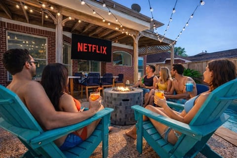 Unwind poolside with your favorite drink and great company