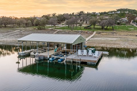 Private boat dock on the lake — ideal for fishing, kayaking, or enjoying serene waterfront views.