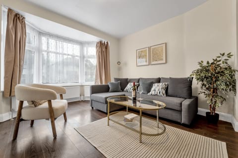 living room sofa plant armchair coffee table