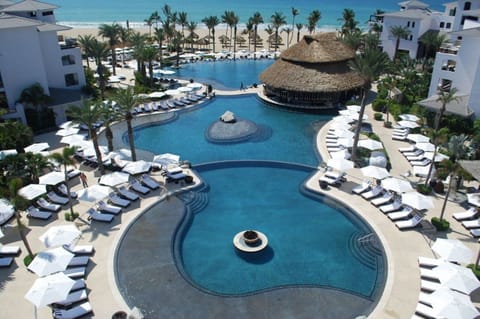 Bask in resort glamour with sweeping pools and beachfront views.