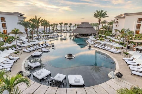 Soak up sunset serenity over the lagoon pool and ocean beyond.