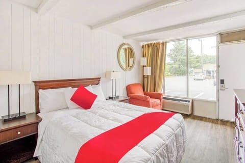 Wake up to soft daylight in a cozy, airy room.