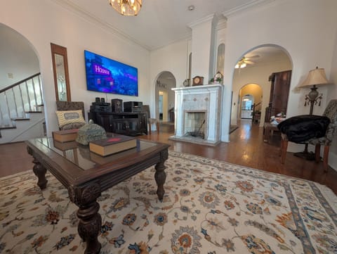 living room with 70" smart tv