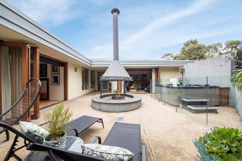 Resort-style courtyard with fire pit — the perfect gathering space day or night.