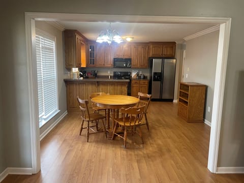 Kitchen with eat in table.