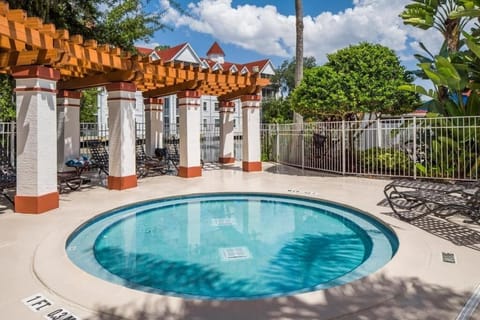 Cool off in a quiet splash pool beneath dappled shade.