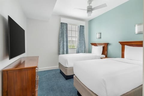 Settle into twin beds for easy, comfortable nights together.