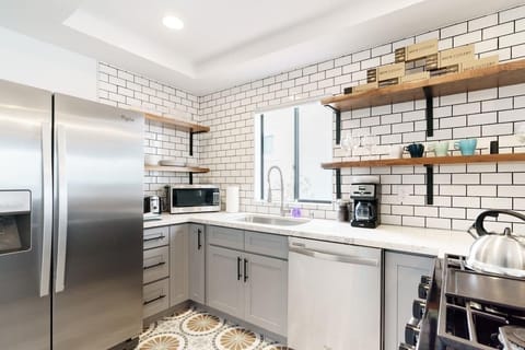 Open, full kitchen with high end appliances