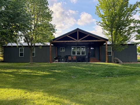 Enjoy morning coffee or evening dinners on the large covered patio.