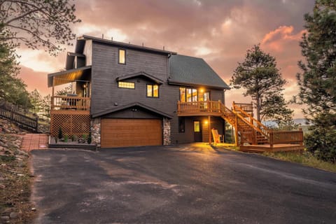 Private paved driveway and parking by the house.
