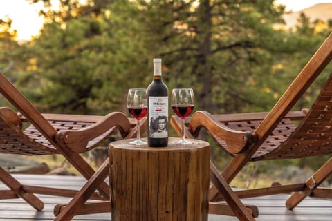 Deck Lounging at its Finest – Settle into the chairs beside the hot tub and toast the mountains as the sun fades to gold.