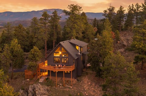 Welcome to Zenya Haus – A serene Colorado Dreamscape glowing in the pines and waiting to welcome you home.