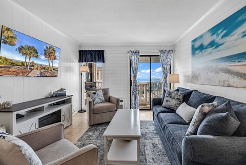 55" Smart ROKU TV and Electric Fireplace in Living Room