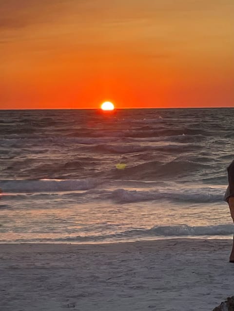 Sunsets at SK Beach are beautiful. Beach chairs and wagon provided by host.