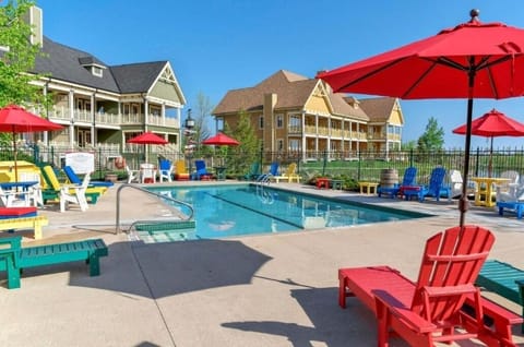 Dive into sunlit fun with loungers, umbrellas, and resort vibes.
