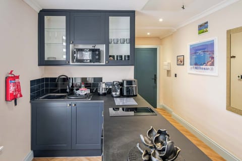 The kitchen includes utensils, kettle, toaster, fridge, microwave and hob. Please note there is no oven