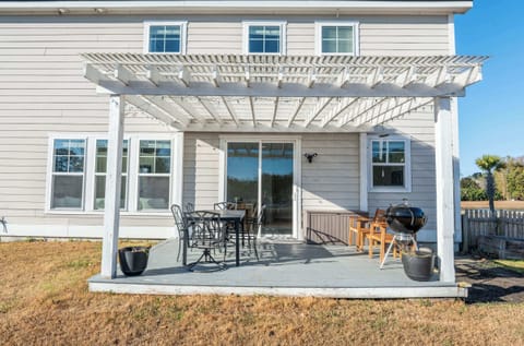 Dine al fresco under the pergola — your backyard escape starts here.